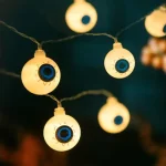 Különleges ajánlat Halloween LED-es fényfüzér szemgolyó 12 LED 2xAA 1,65m 56528C